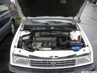 It was really hard to find someone proud enough to post a picture of the n/a 2.2L. Photo from theturthaboutcars.com